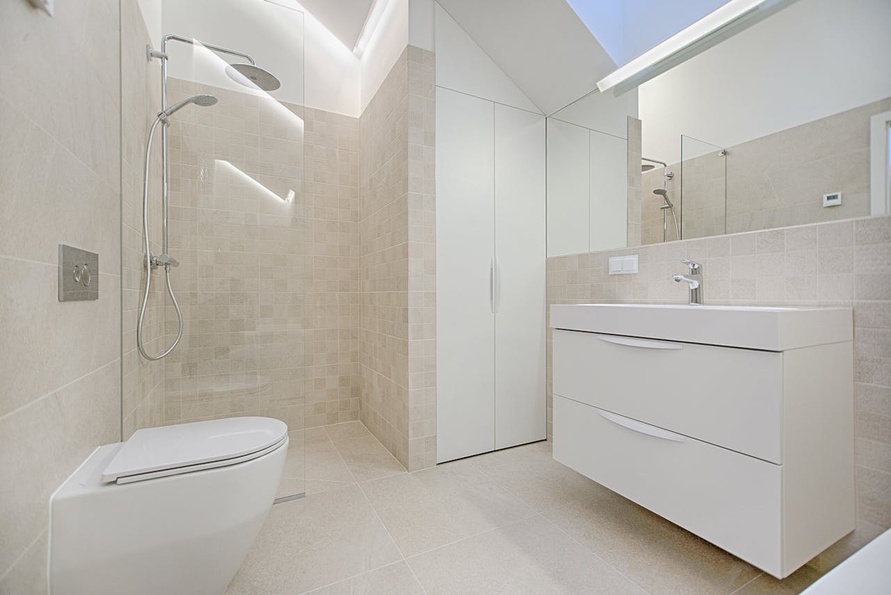 our-value Bright and luxurious bathroom with contemporary fixtures and sleek design.